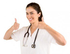 Smiling Nurse With Thumbs Up Posing